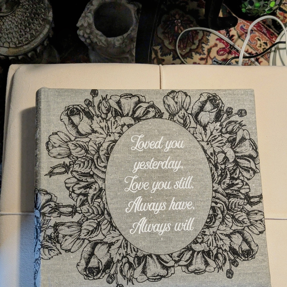 Elegant gray photo album with floral design and sparkles. Acid free.